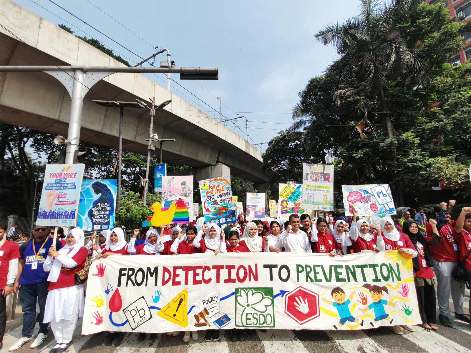 Youth rally demands strict enforcement of lead standards & early detection