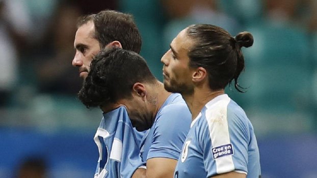 As Suarez fails to score in shootout, Uruguay out of Copa