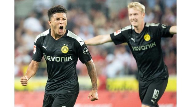 Sancho inspires Dortmund comeback against Cologne