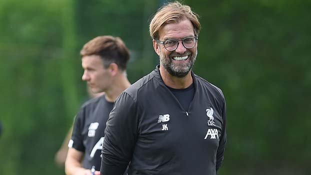 Klopp expects no easy ride in CL defence