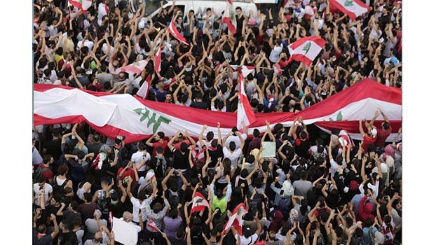 Lebanon’s government scrambles to respond to mass protests