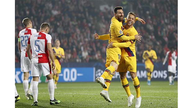 Messi's historic goal helps Barcelona edge Slavia Prague