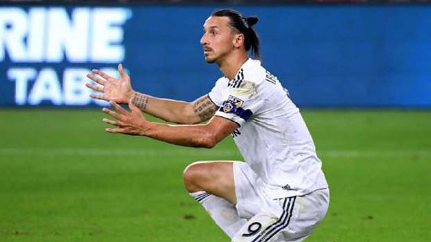 Ibrahimovic displays vulgar gesture in showdown with fan