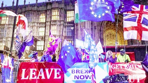 UK government, planning for election, postpones budget