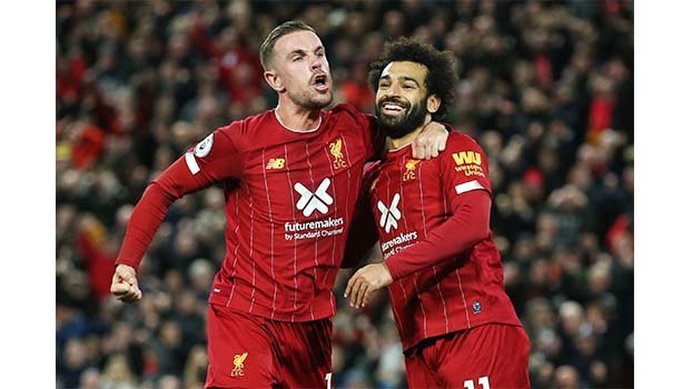 Liverpool march on, United end away day misery