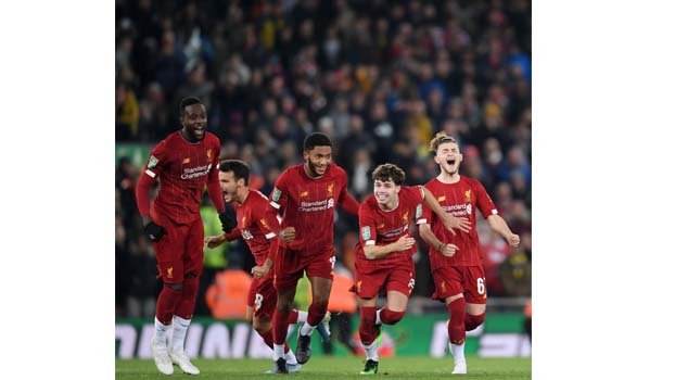 Liverpool edge Arsenal on penalties after 10-goal thriller