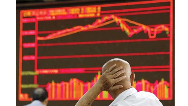 Asian markets mostly down as traders ease into weekend