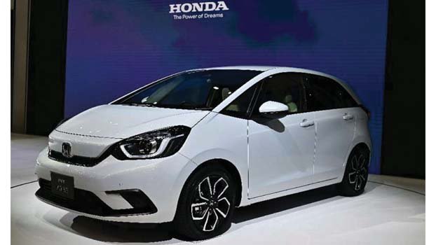 Honda first-half net profit slumps 19pc, full-year forecast down