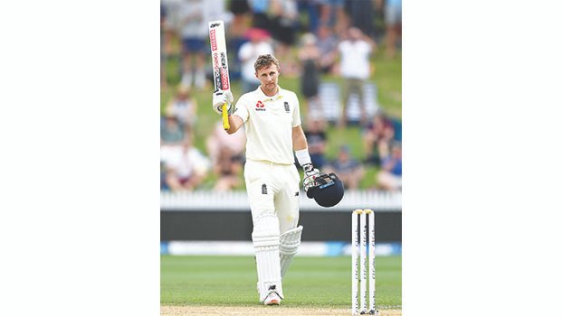 Root leads England with ton on day 3