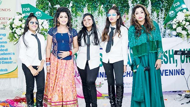Nipun and Polin with women suffering breast cancer and street children