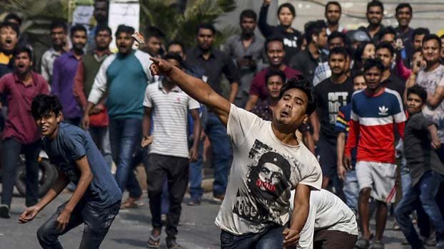 Thousands defy curfew in Assam over citizenship law