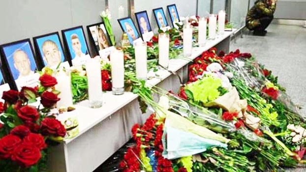Flowers, candles for doomed Ukrainian flight crew