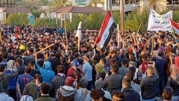 Iraq protesters defiant  as they bury martyrs