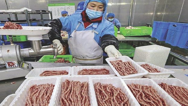 China scrambles to keep cities in virus lockdown fed