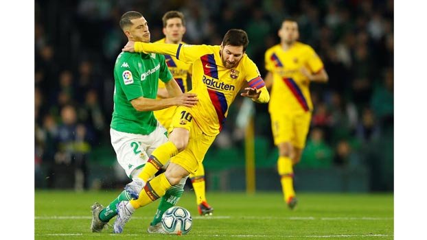 Messi shines as Barca edge past Betis