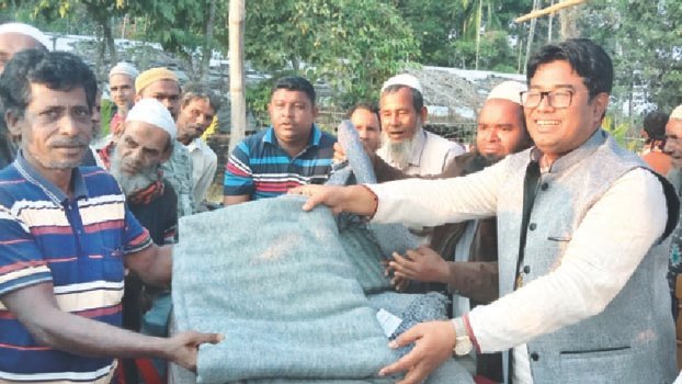 Warm clothes on behalf of PM distributed in Teknaf