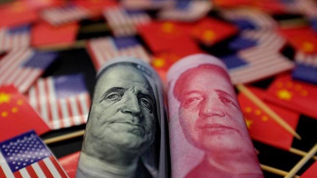 US-China trade truce at risk as virus hits global economy