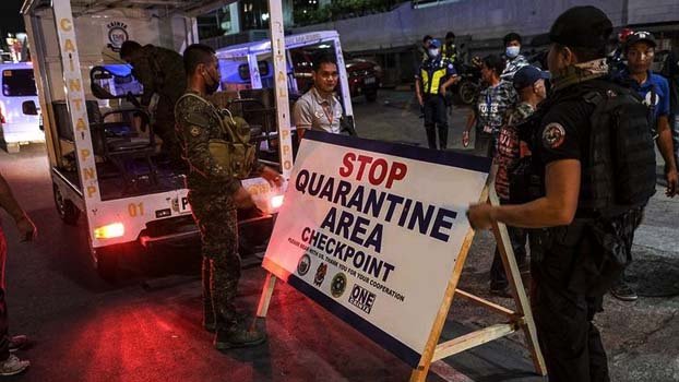 Philippines close off capital to fight virus