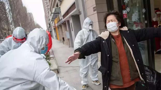 China reports 125 new virus cases, day’s lowest in  six weeks