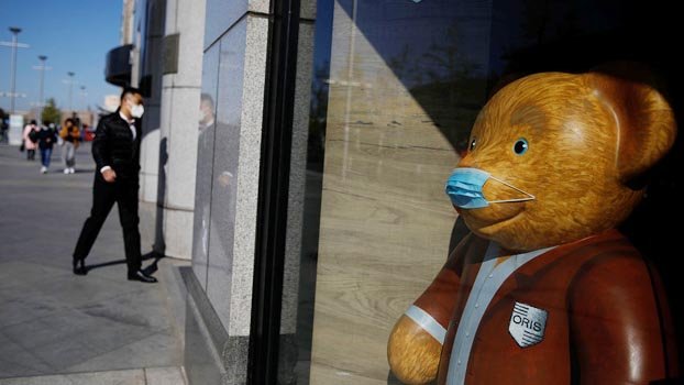 China in lockdown as fears grow over second wave of virus