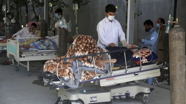 Long-shut factory helps Covid-struck Afghans breathe free