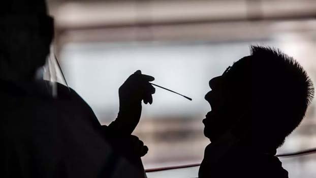 Asian markets turn lower as virus spikes around planet