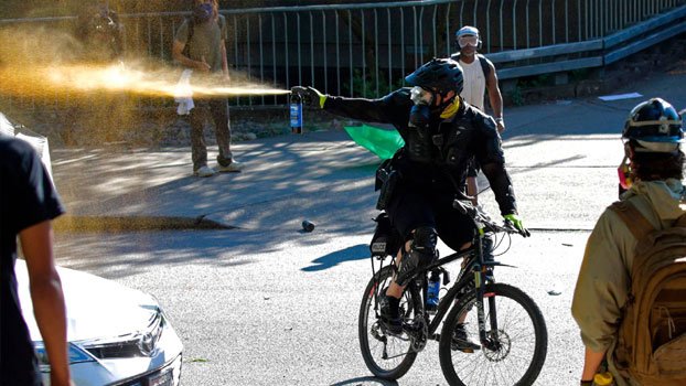 Protesters clash with Seattle police in latest outcry over US feds