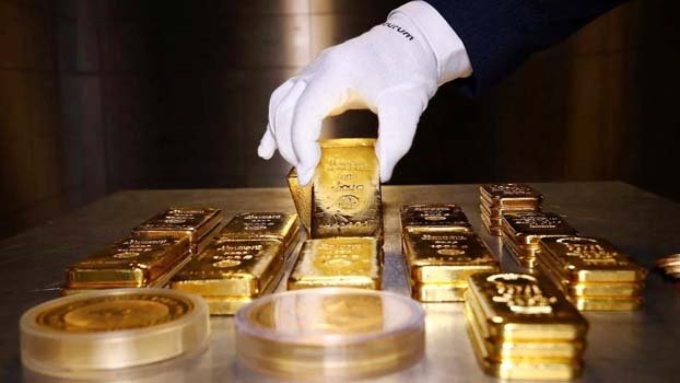 Gold hits new record, equities  up on US stimulus hope