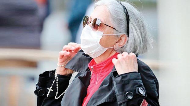 Pressure grows in France to tighten mask rules