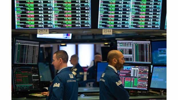 Stock markets soar to record highs