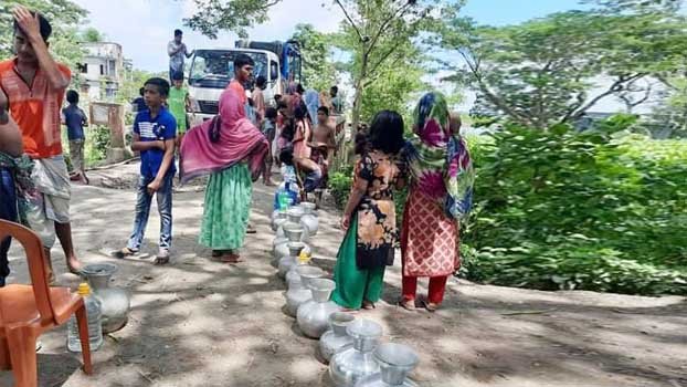 DPHE distributes safe water, purification tablet in Gopalganj