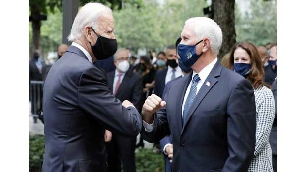 US remembers 9/11, with virus altering familiar tributes