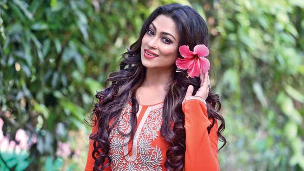 Popy as Purba in ‘Bhalobashar Projapoti’ 