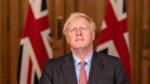 UK’s Johnson bids to woo restive party members