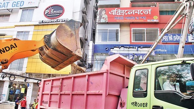 Removal of illegal   billboards, hoardings begins in Dhaka