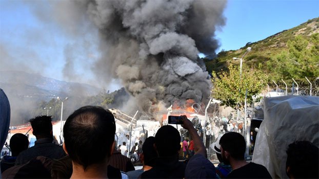 Fire burns tents, structures in Greek refugee camp
