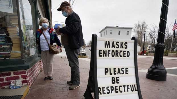 Oregon, New Mexico order lockdowns, other states resist