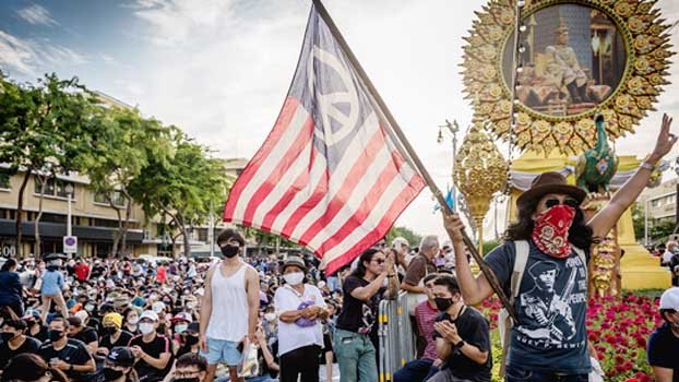 Thai protesters, police clash as MPs mull charter change