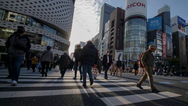 Japan business confidence improves again