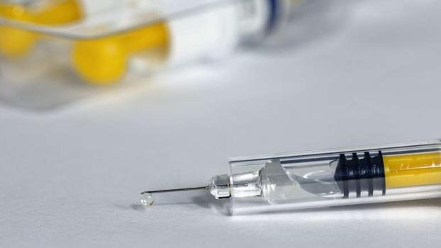 Germany pressuring EU to speed up vaccine approval report