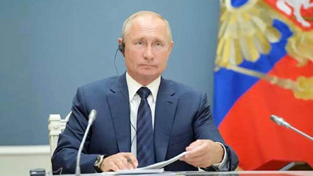 Putin says Russia reducing dependence on oil and gas