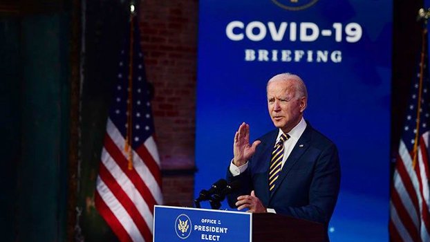 New virus variant hits US as Biden vows all-out effort