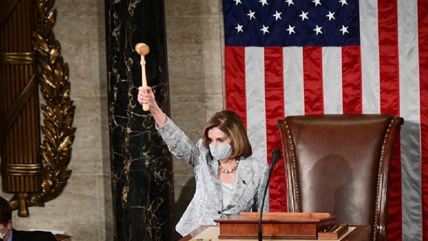 Pelosi narrowly reelected speaker, faces difficult 2 years