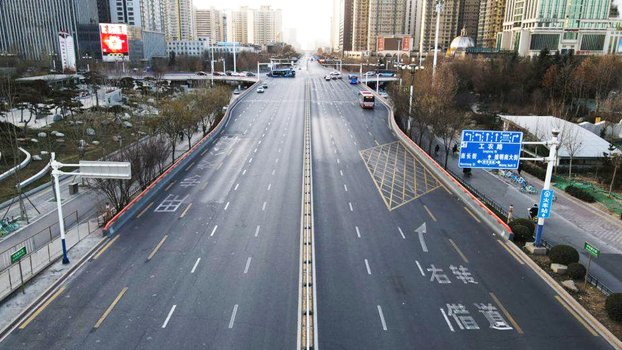 China places 11m under lockdown after outbreak in northern city