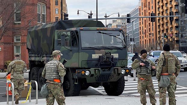 Guard troops pour into Washington as states answer the call