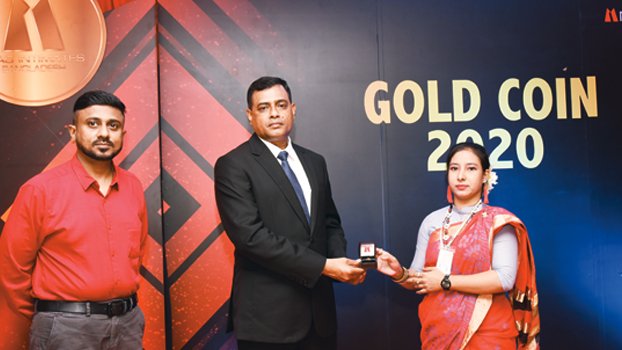 BEPZA chief distributes ‘Gold Coin’ among dedicated workers
