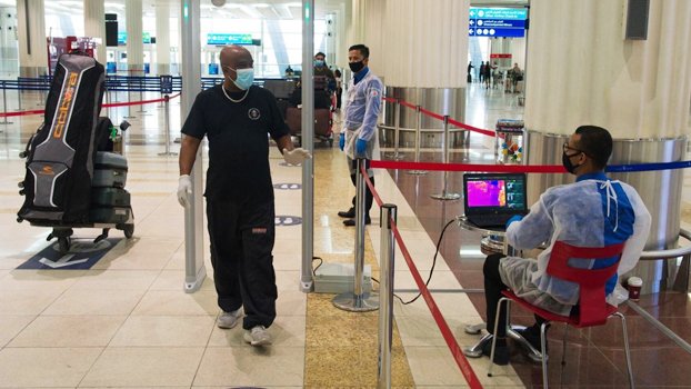Dubai blamed for virus cases abroad; questions swirl at home