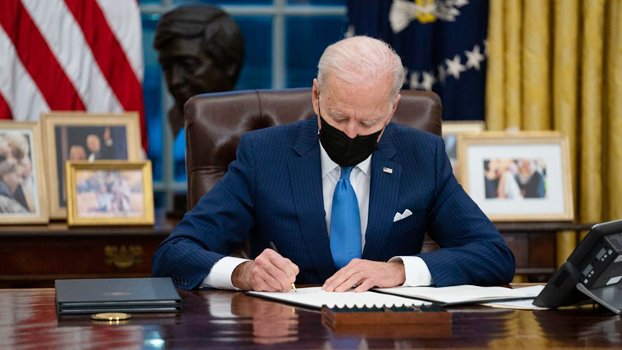 Biden signs immigration orders as Congress awaits more