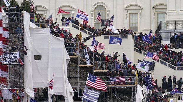 Man charged in US Capitol riot worked for FBI, lawyer says