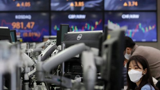 Markets, oil drop in Asia but bitcoin targets $50,000